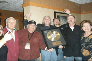 Jimmy Jay with Harmony Guitar and Gold Record