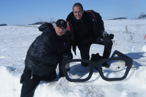 Jimmy Jay And Jim Marsella Pose at the crash site with Buddy Holly's glasses