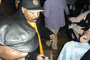 Al "Caesar" Berry of The Tymes signs autographs